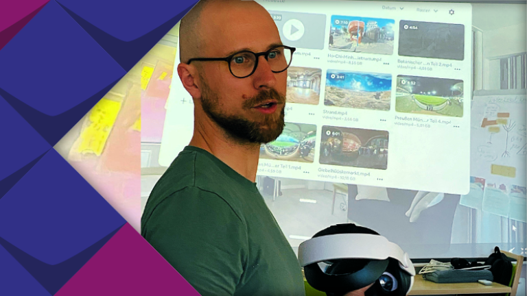 Das Foto zeigt Marcel Scharf. Er trägt Bart und Brille. Seine Haare hat er ganz kurz rasiert. Er trägt ein grünes T-Shirt. In der Hand hält er eine VR-Brille.